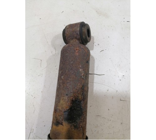 Амортизатор подвески задний левый