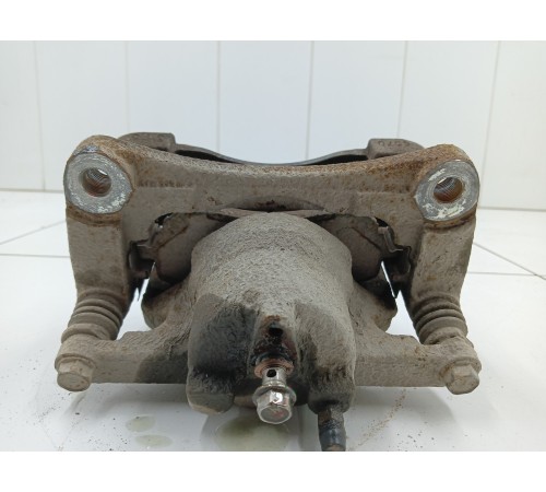 Суппорт передний левый