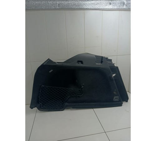 Обшивка багажника левая