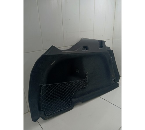 Обшивка багажника левая