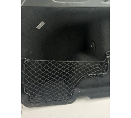 Обшивка багажника левая