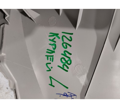 Обшивка багажника левая