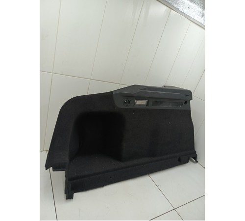 Обшивка багажника левая