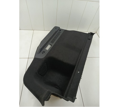 Обшивка багажника левая