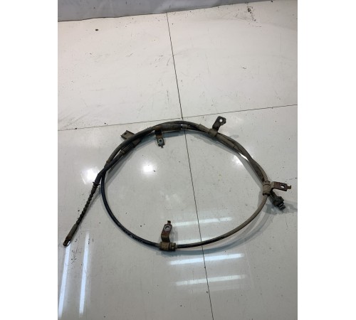 Трос стояночного тормоза (задний, левый)