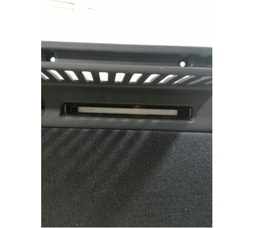 Обшивка багажника левая