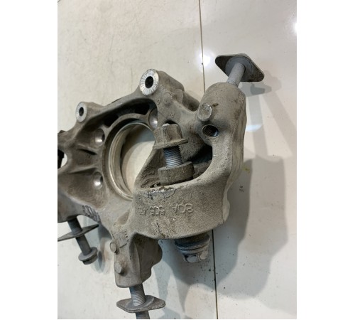 Кулак поворотный (задний, левый)