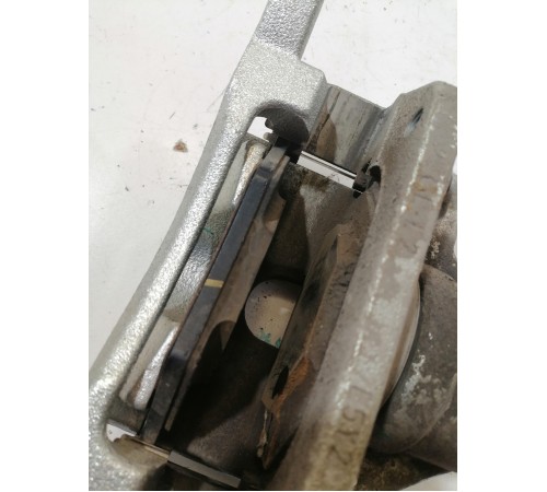 Суппорт тормозной передний левый