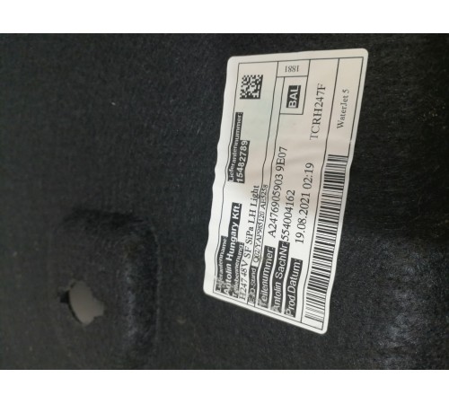 Обшивка багажника левая