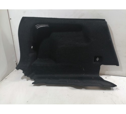Обшивка багажника левая