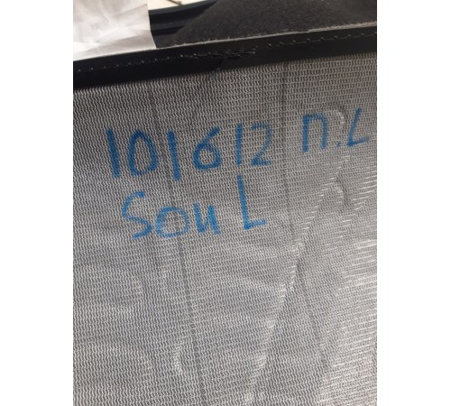 Обшивка спинки переднего левого сидения