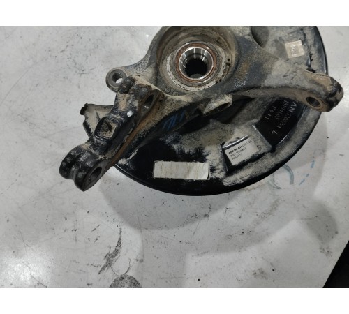 Кулак поворотный передний левый в сборе