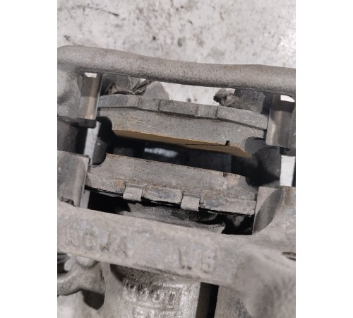 Суппорт тормозной задний левый