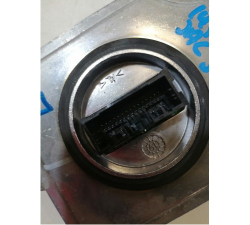 Блок розжига фар левый