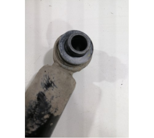 Амортизатор задний левый