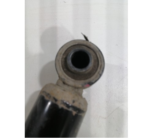 Амортизатор задний левый