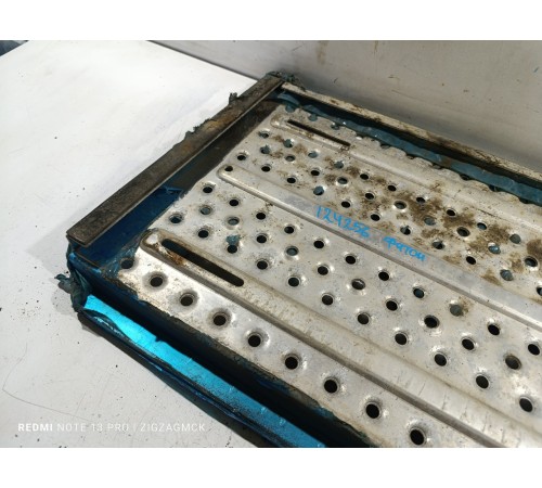 Площадка на раме задней части кабины