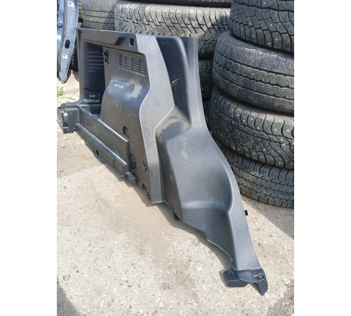 Обшивка багажника задняя левая