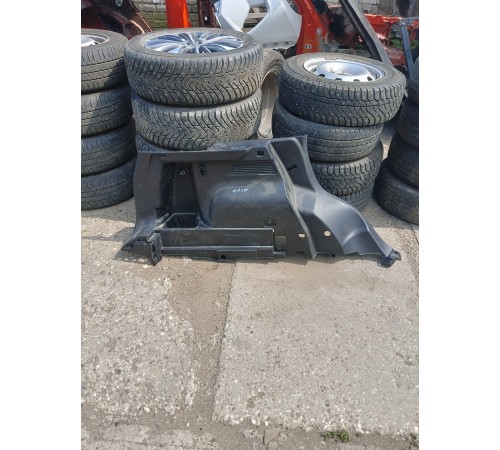 Обшивка багажника задняя левая