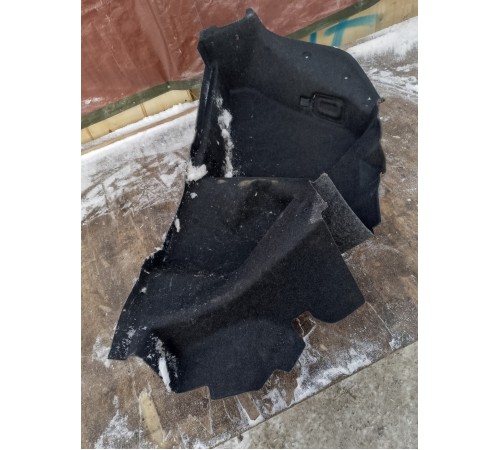 Обшивка багажника левая