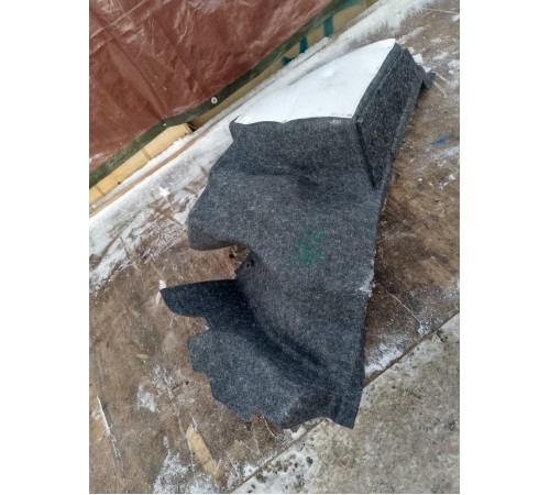 Обшивка багажника левая