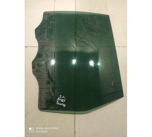 Стекло двери (заднее левое)