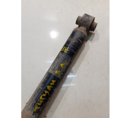 Амортизатор (задний, левый)