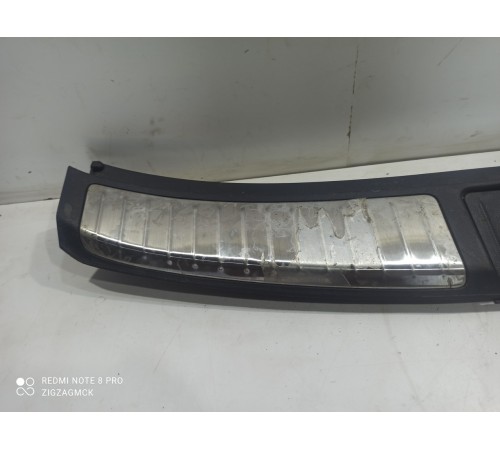 Накладка замка крышки багажника нижняя