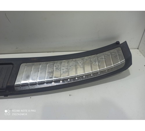 Накладка замка крышки багажника нижняя