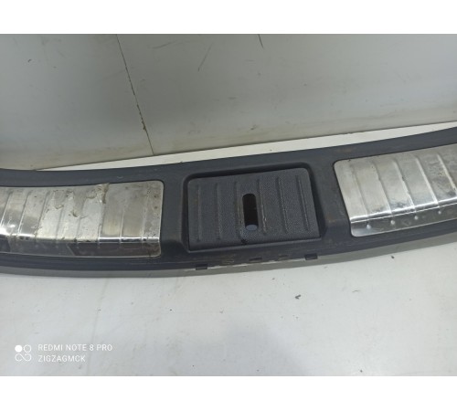 Накладка замка крышки багажника нижняя