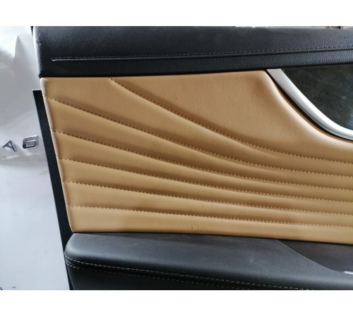 Обшивка двери передняя левая