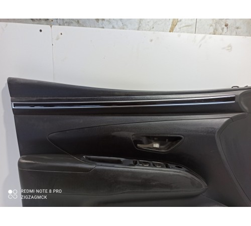 Обшивка двери передняя левая