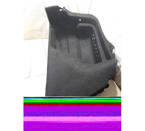 Обшивка багажника (левая)