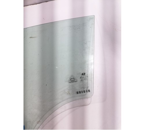 Стекло двери переднее левое