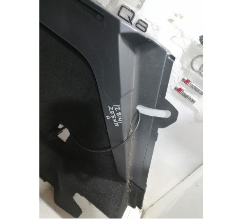 Обшивка багажника левая