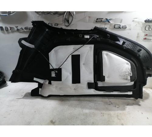 Обшивка багажника левая