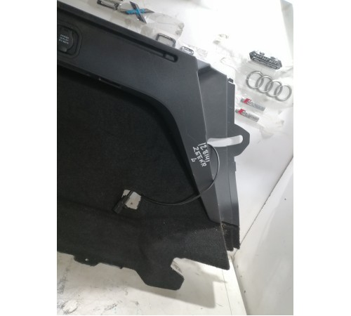 Обшивка багажника левая