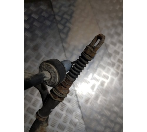 Трос стояночного тормоза задн. лев.