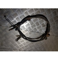 Трос стояночного тормоза задн. лев.