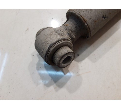 Амортизатор (задний, левый)