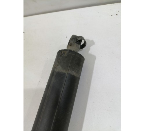 Амортизатор крышки багажника левый