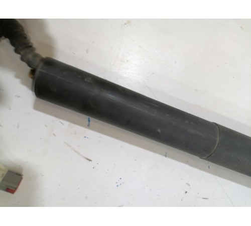 Амортизатор крышки багажника левый