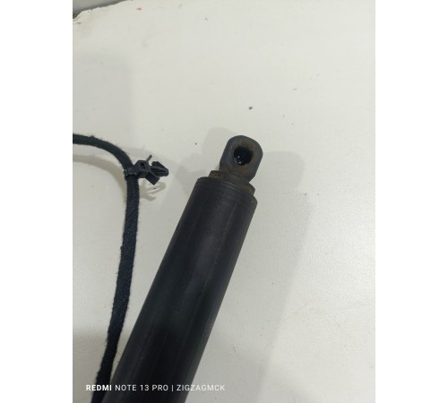 Амортизатор двери крышки багажника левый