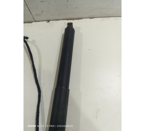 Амортизатор двери крышки багажника левый