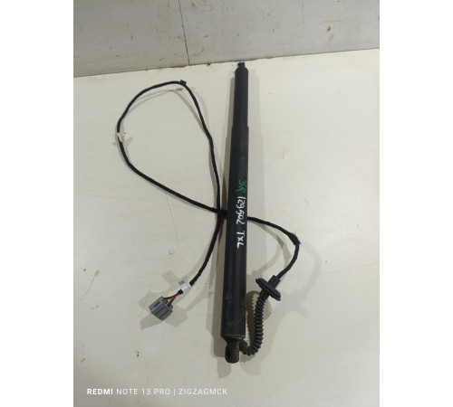 Амортизатор двери крышки багажника левый