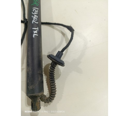 Амортизатор двери крышки багажника левый