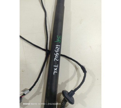 Амортизатор двери крышки багажника левый