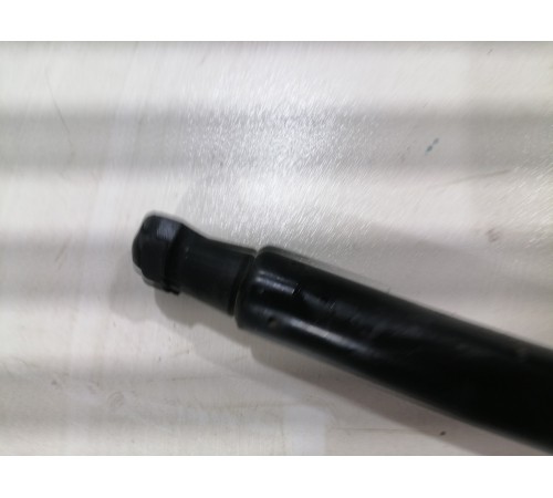 Амортизатор капота левый