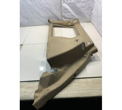 Обшивка багажника (левая)