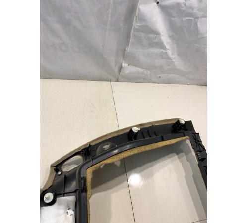 Обшивка багажника (левая)